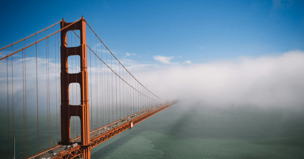 The Golden Gate Bridge disappearing off into some clouds